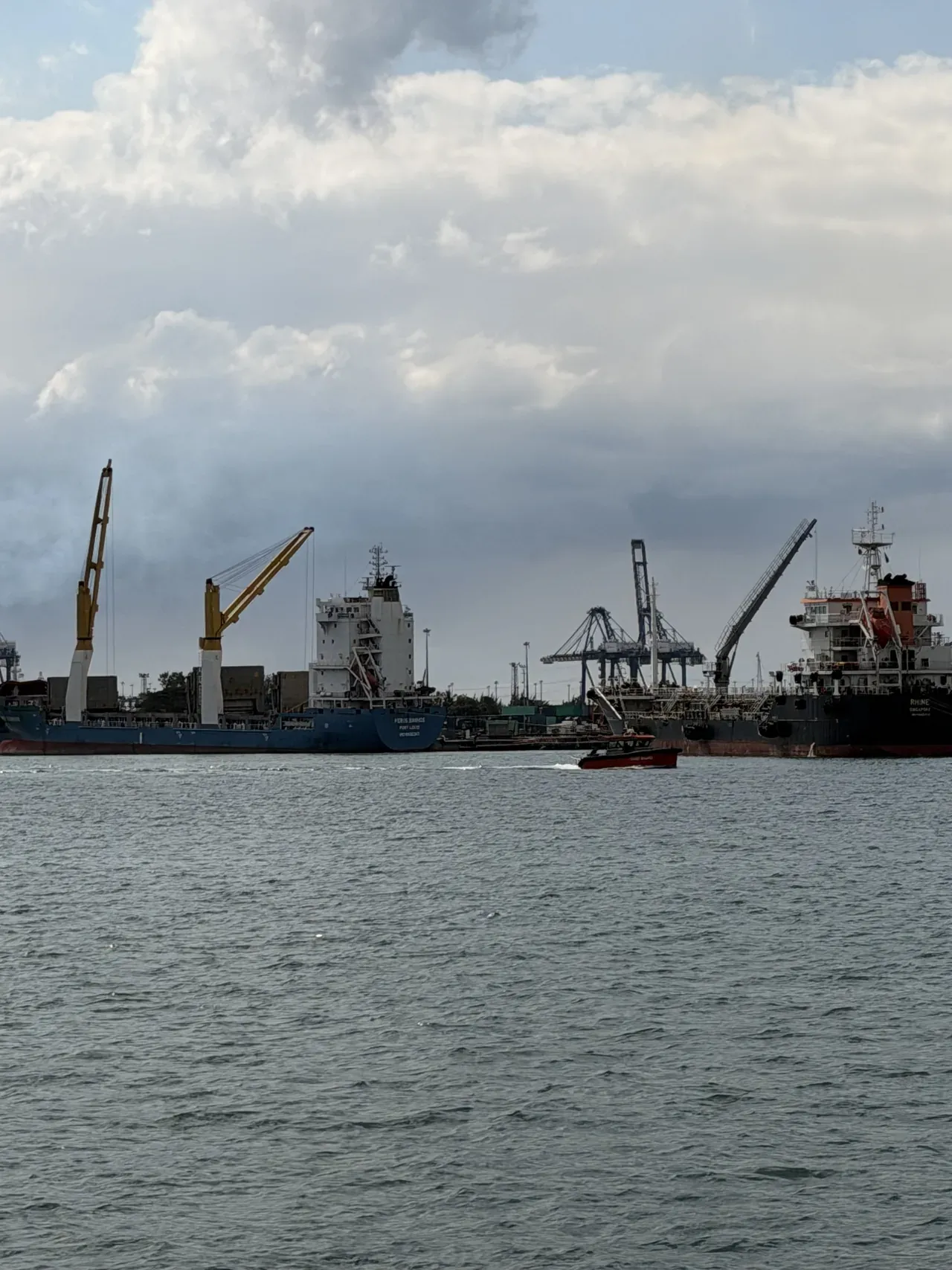 Cargo vessels berthed at the port of Toamasina, Madagascar.